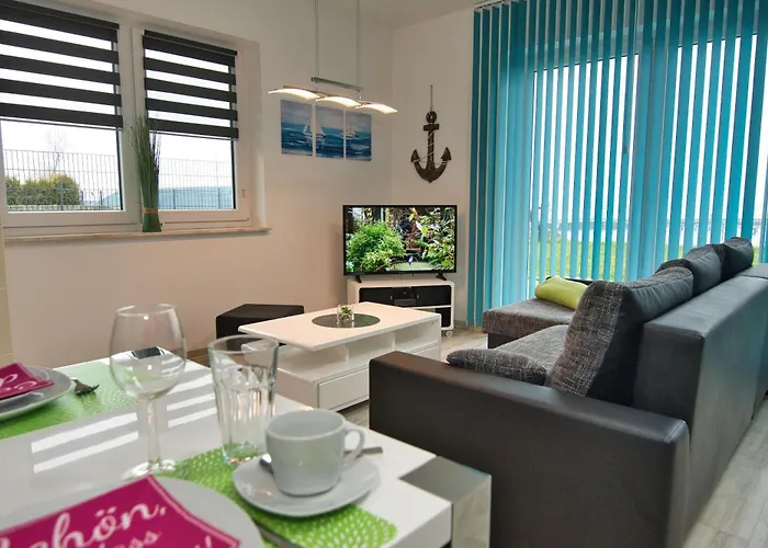 Ruegenblick Haushaelfte Апартаменты *